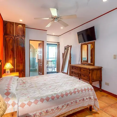 Warm Interiors And Orange Hues On Ground Floor In Front Of Beach