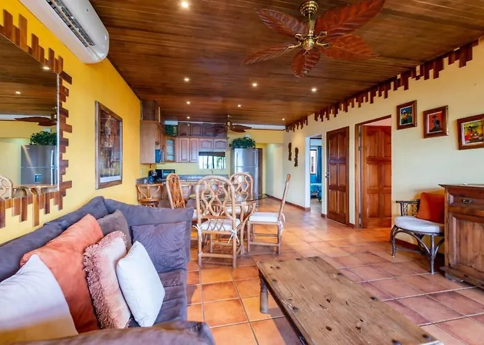 Beachfront With Warm, Rustic Interiors & Direct Access To