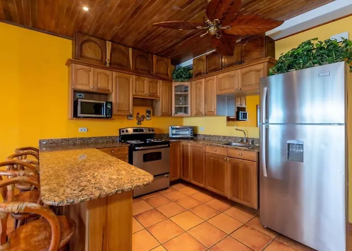 Beachfront With Warm, Rustic Interiors & Direct Access To Holiday home
