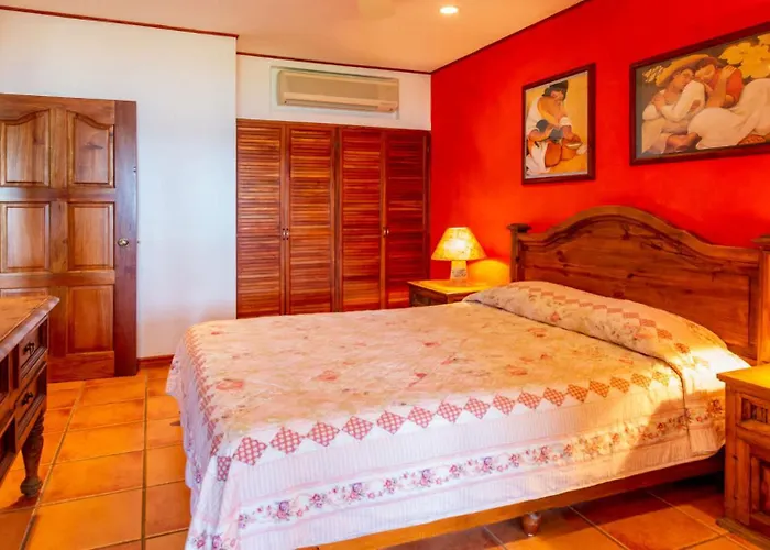 Beachfront With Warm, Rustic Interiors & Direct Access To *